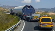 Special oversized transport truck with convoy vehicle